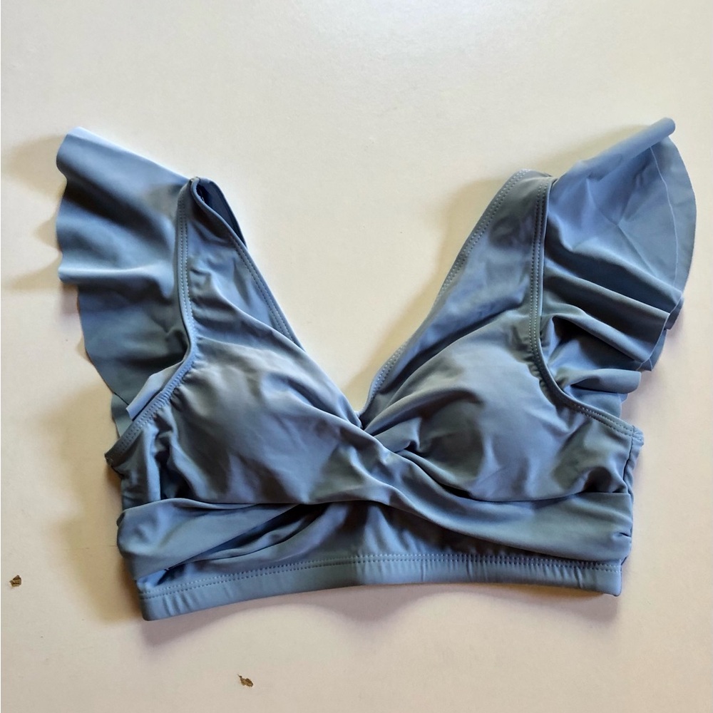 Light blue bikini top with ruffle sleeves
